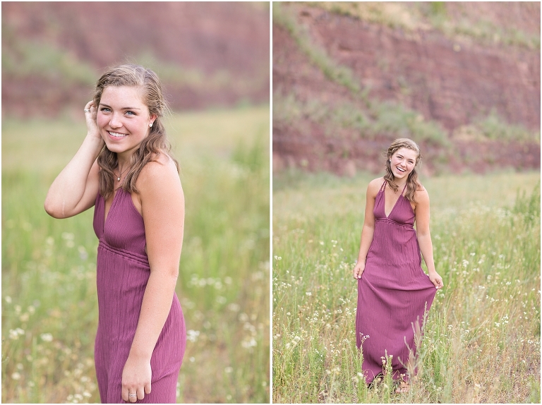 Senior photos of a girl in a purple dress in a flower field