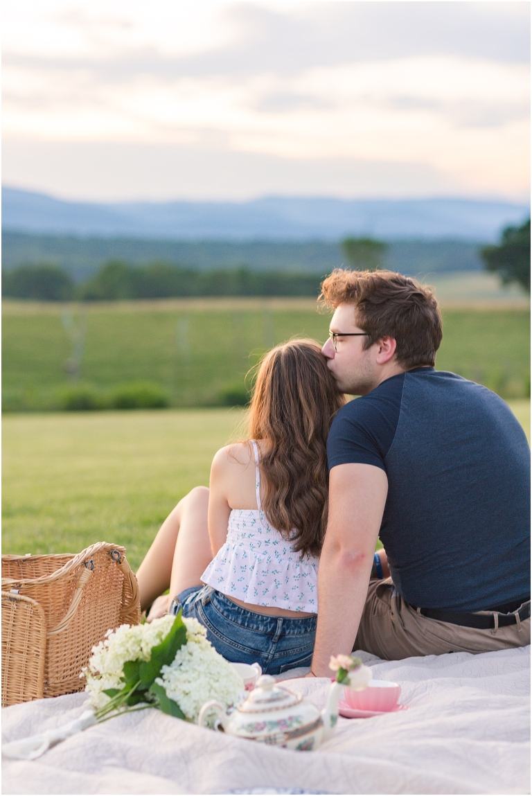 Why you need a blog for your business: so you can show inspiration for their engagement sessions, such as this sunset picnic with a mountain view