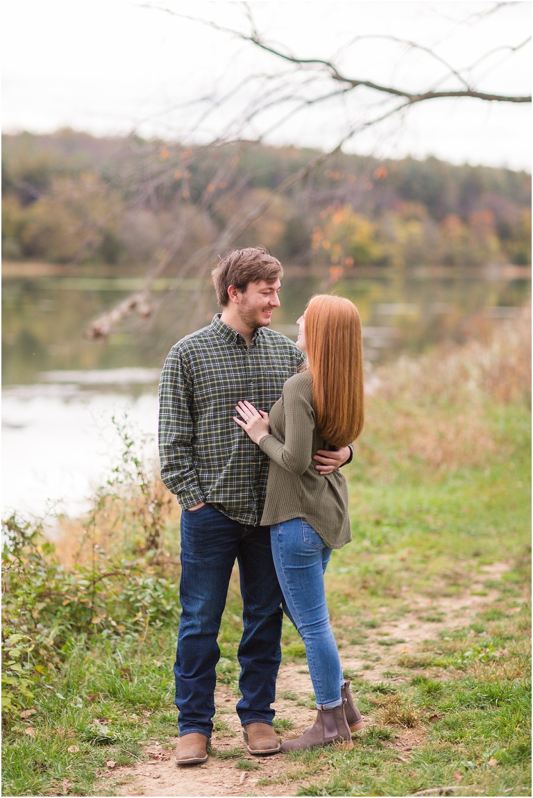 Autumn engagement session at Lake Shenandoah with fall colors with lake in background.