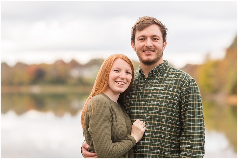 Autumn engagement session at Lake Shenandoah with fall colors and beautiful lake in background.