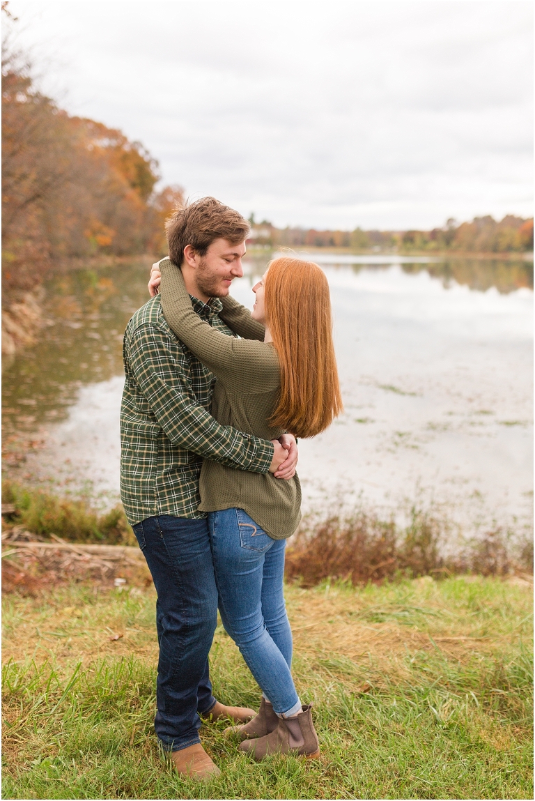 Autumn engagement session at Lake Shenandoah with fall colors with the lake in the background.