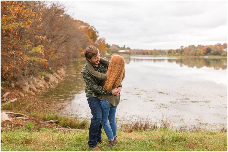 Autumn engagement session at Lake Shenandoah with fall colors with the lake in the background.