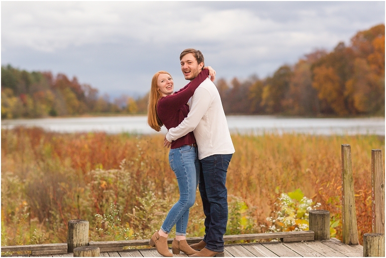 Autumn engagement session at Lake Shenandoah with fall colors and the lake in the background.