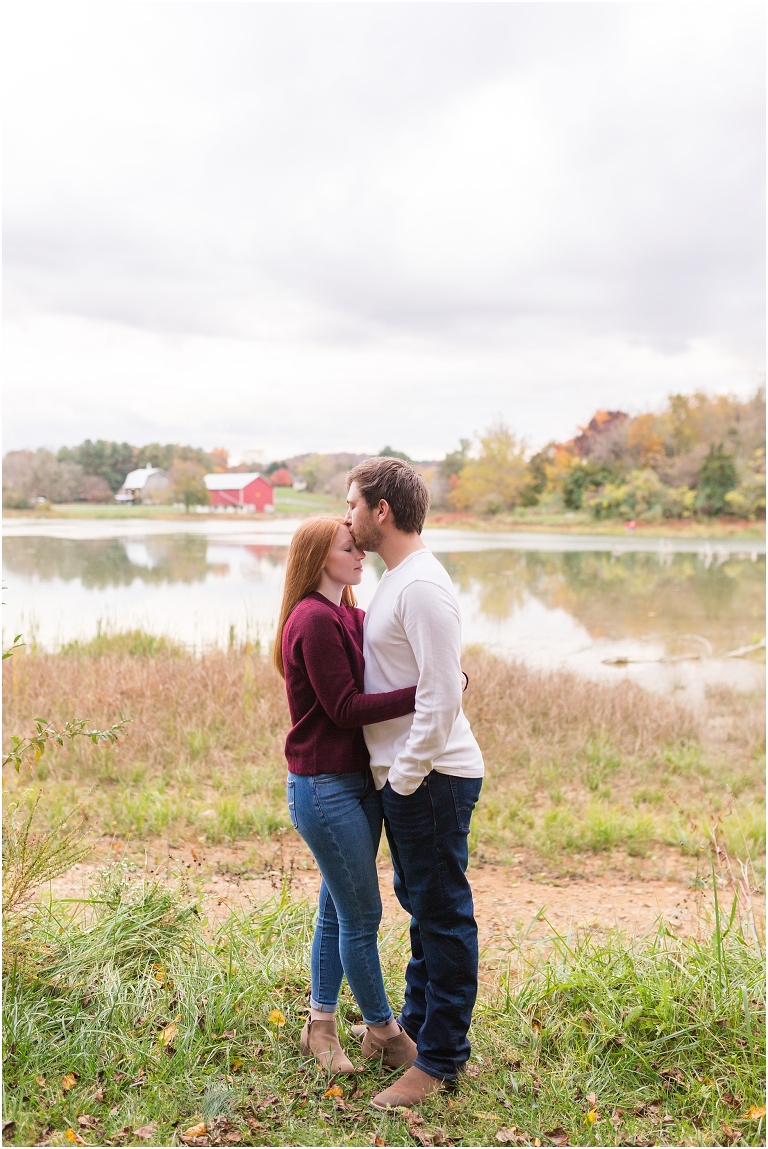 Autumn engagement session at Lake Shenandoah with fall colors and the lake in the background.