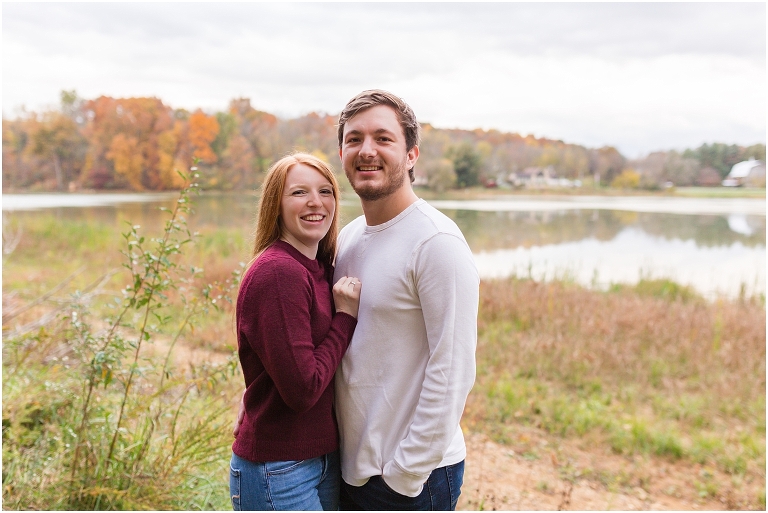 Autumn engagement session at Lake Shenandoah with fall colors and the lake in the background.