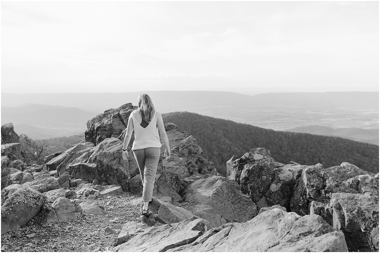 Sunset Hawksbill Summit Skyline Drive senior session with fall foliage and rolling clouds