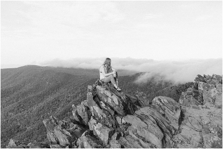 Sunset Hawksbill Summit Skyline Drive senior session with fall foliage and rolling clouds