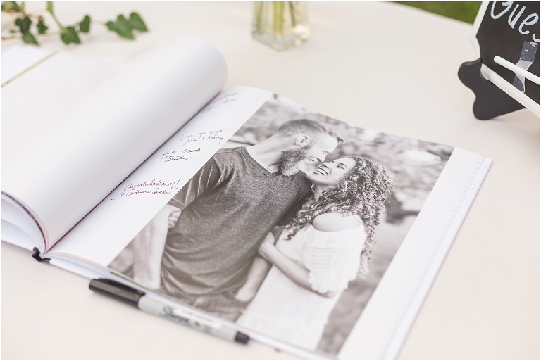 Use your engagement photos to create a wedding guest book. Print a hard back book and print your photos on half the pages. Leave the other pages blank so guests can write in them