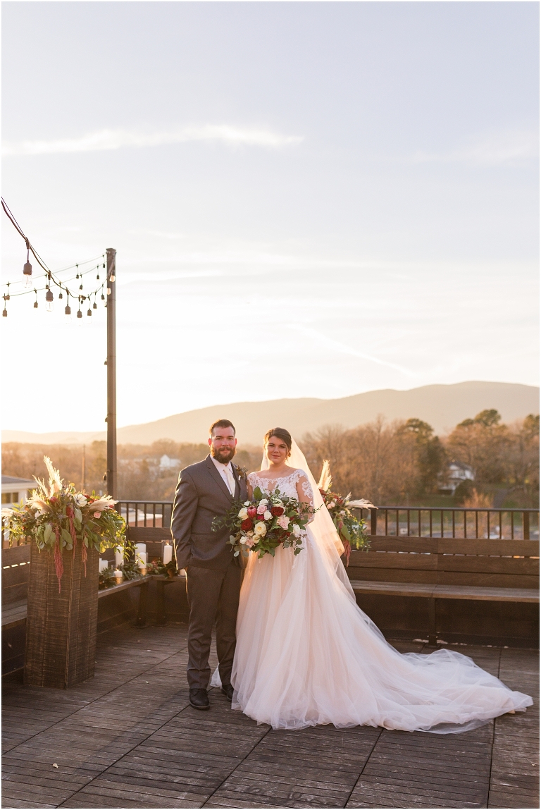 Winter wedding at The Rooftop in Crozet, Virginia. The golden sunset and surrounding views created the most beautiful wedding.