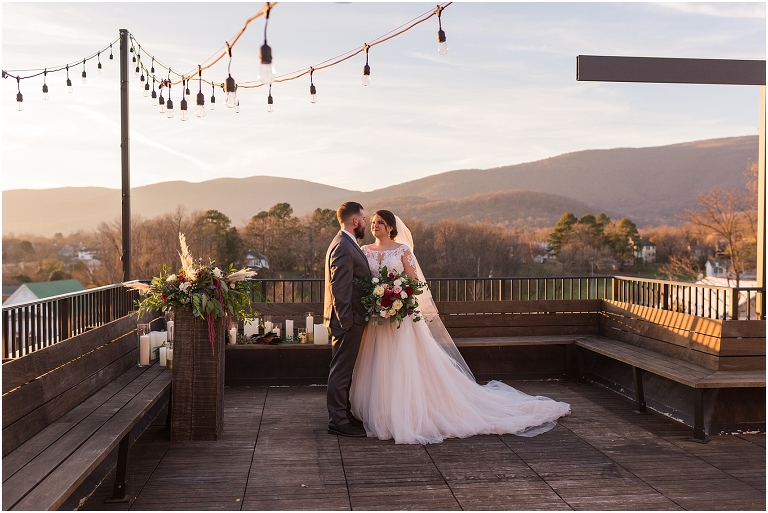 Winter wedding at The Rooftop in Crozet, Virginia. The golden sunset and surrounding views created the most beautiful wedding.