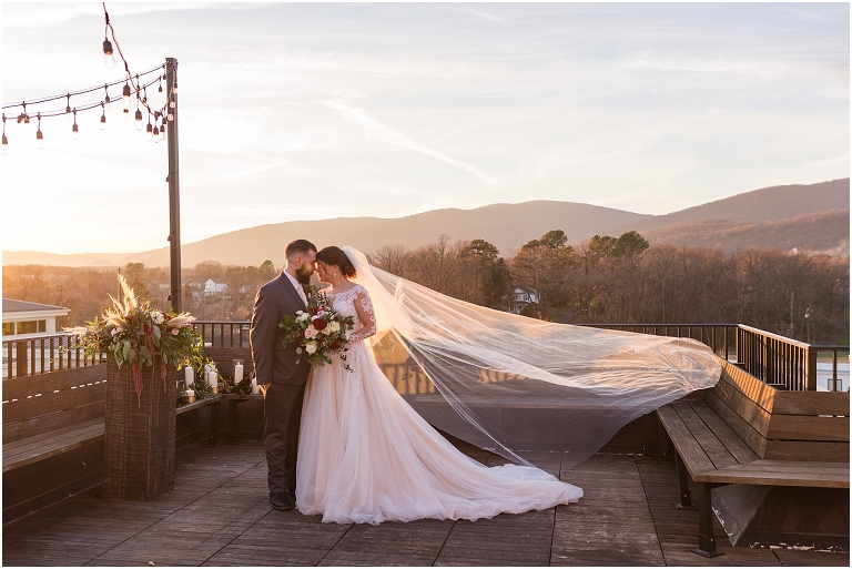 Winter wedding at The Rooftop in Crozet, Virginia. The golden sunset and surrounding views created the most beautiful wedding.