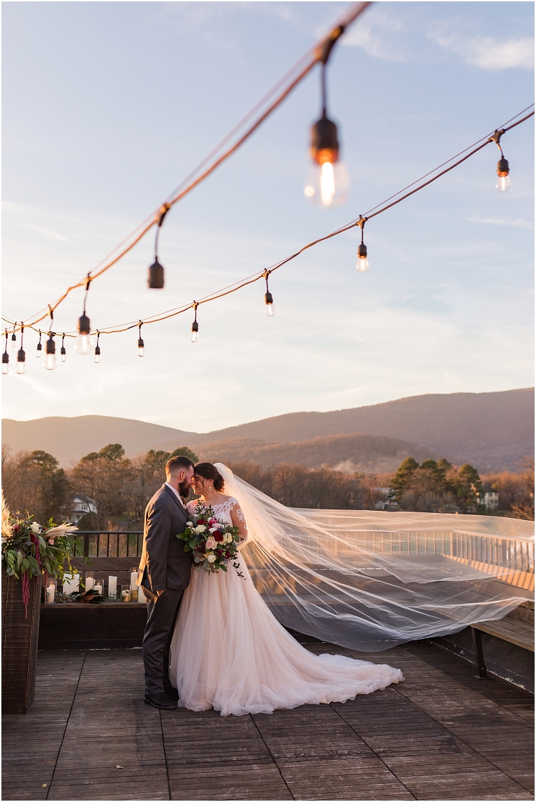 Winter wedding at The Rooftop in Crozet, Virginia. The golden sunset and surrounding views created the most beautiful wedding.