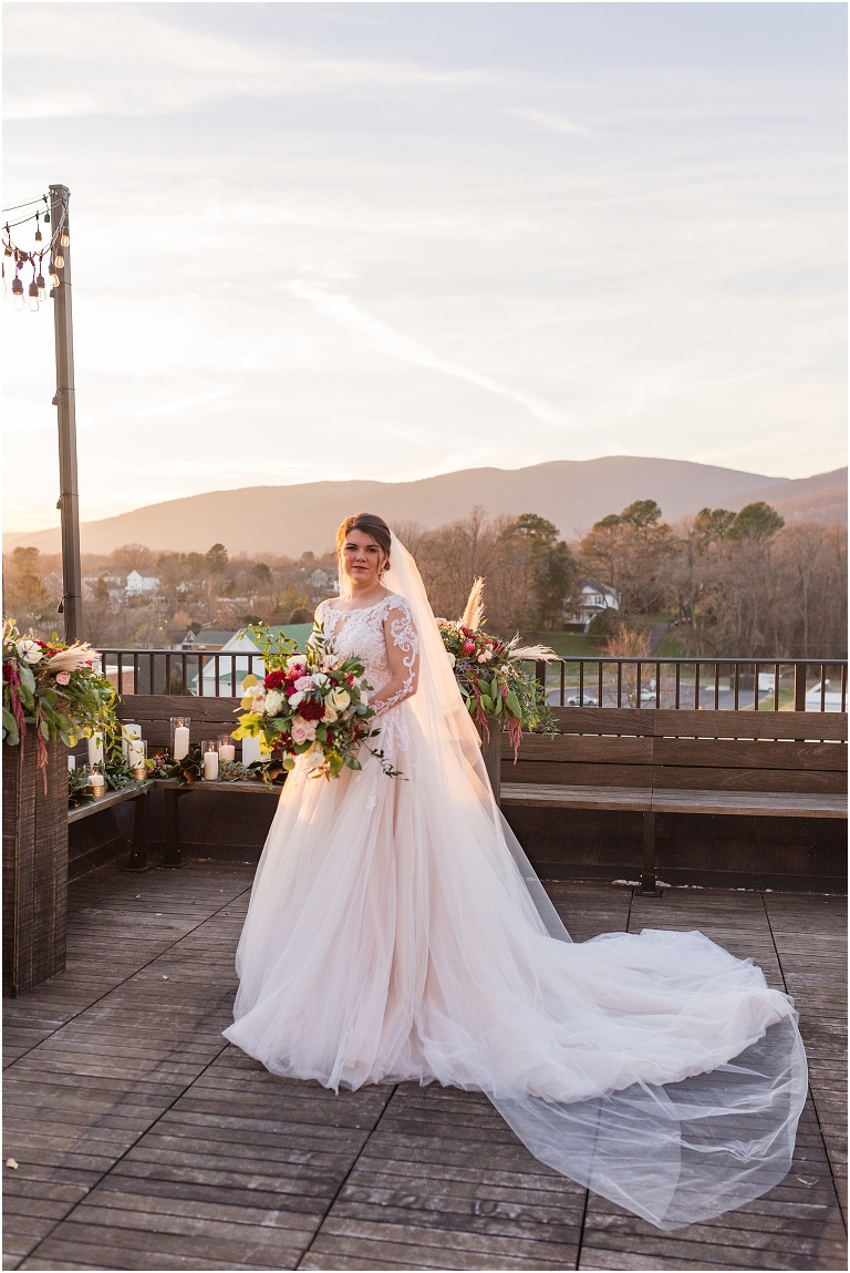 Winter wedding at The Rooftop in Crozet, Virginia. The golden sunset and surrounding views created the most beautiful wedding.