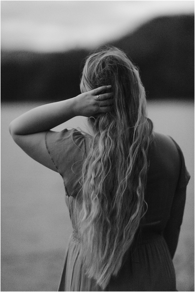 Sunset lakeside senior portraits in black and white