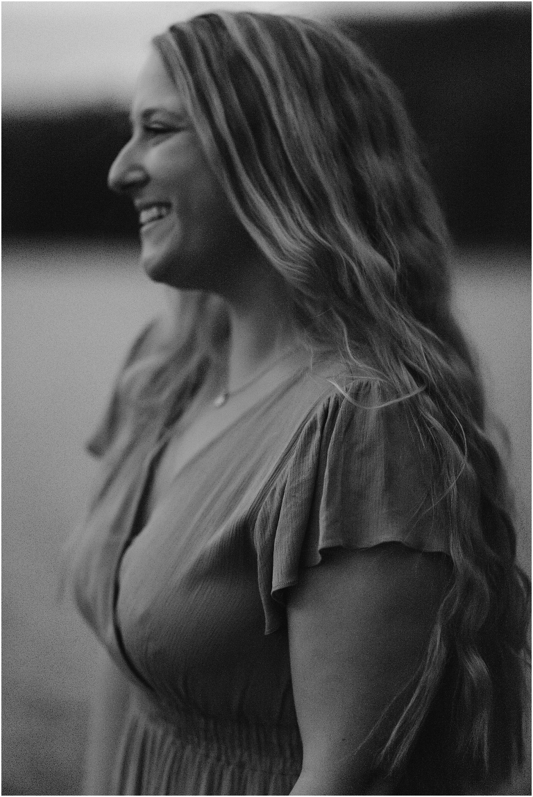 Sunset lakeside senior portraits in black and white