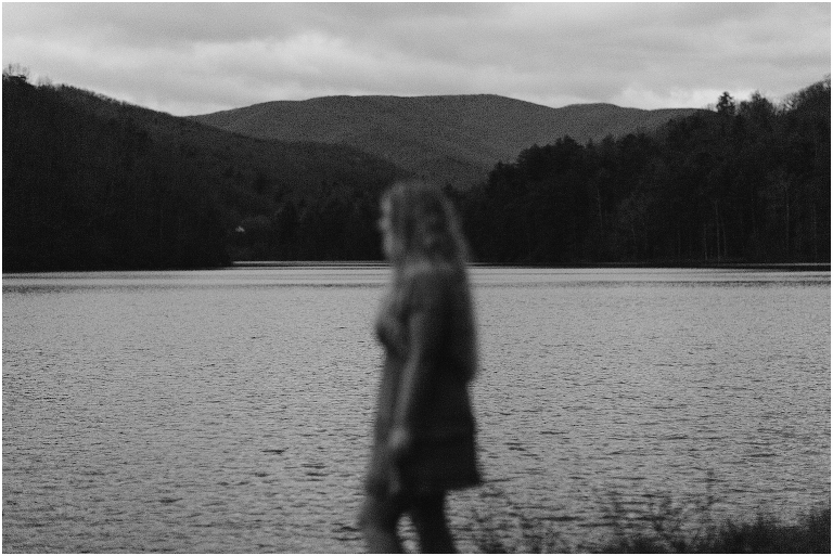 Sunset lakeside senior portraits in black and white