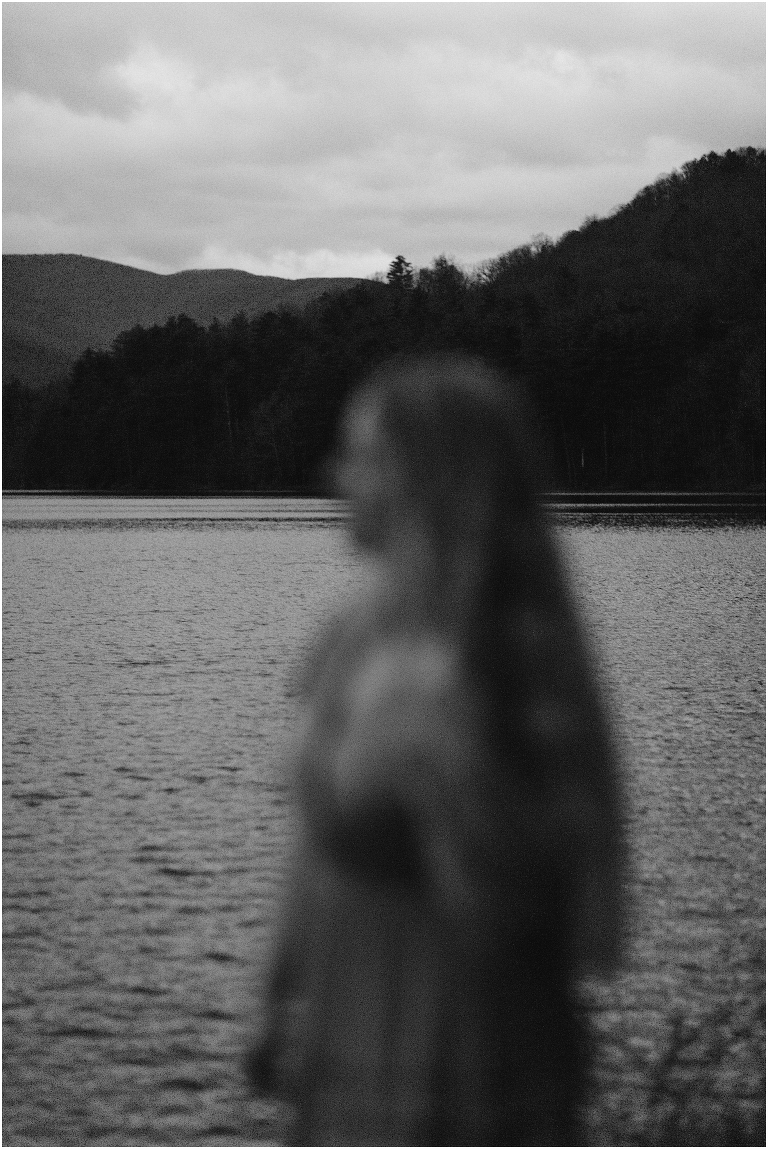 Sunset lakeside senior portraits in black and white