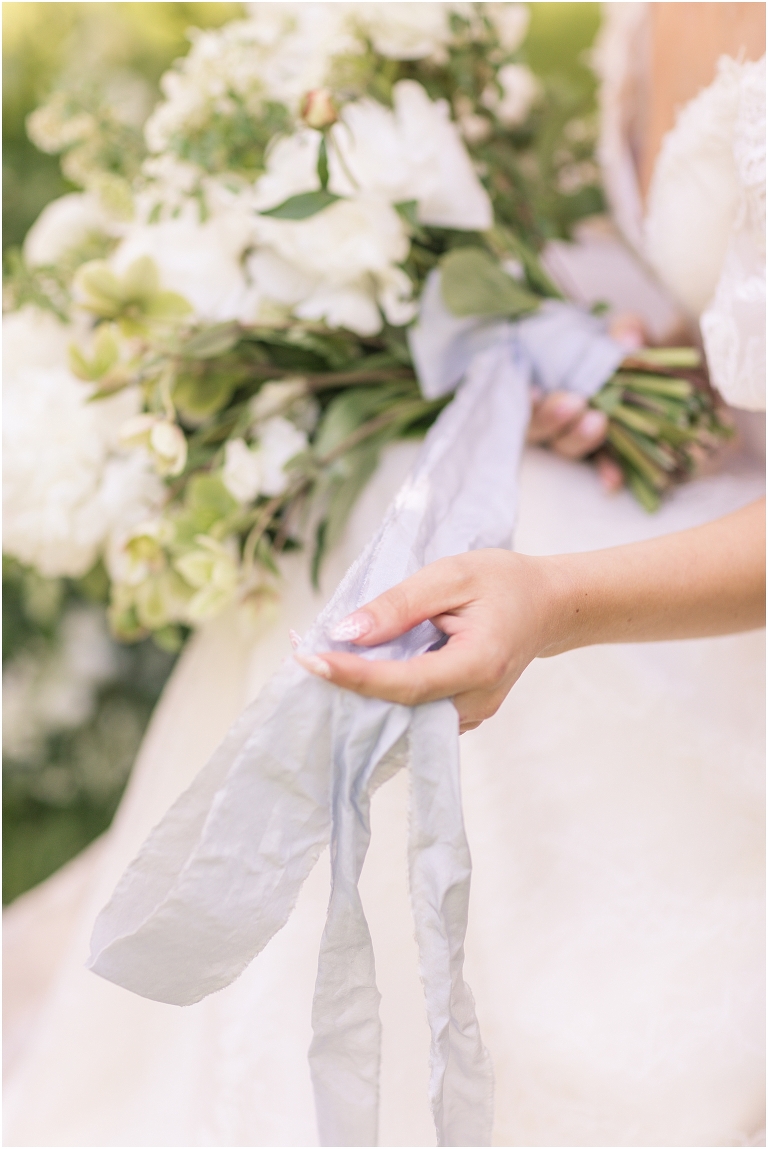 Romantic and classic garden manor wedding inspiration bridal portraits with a settee and floral instillations