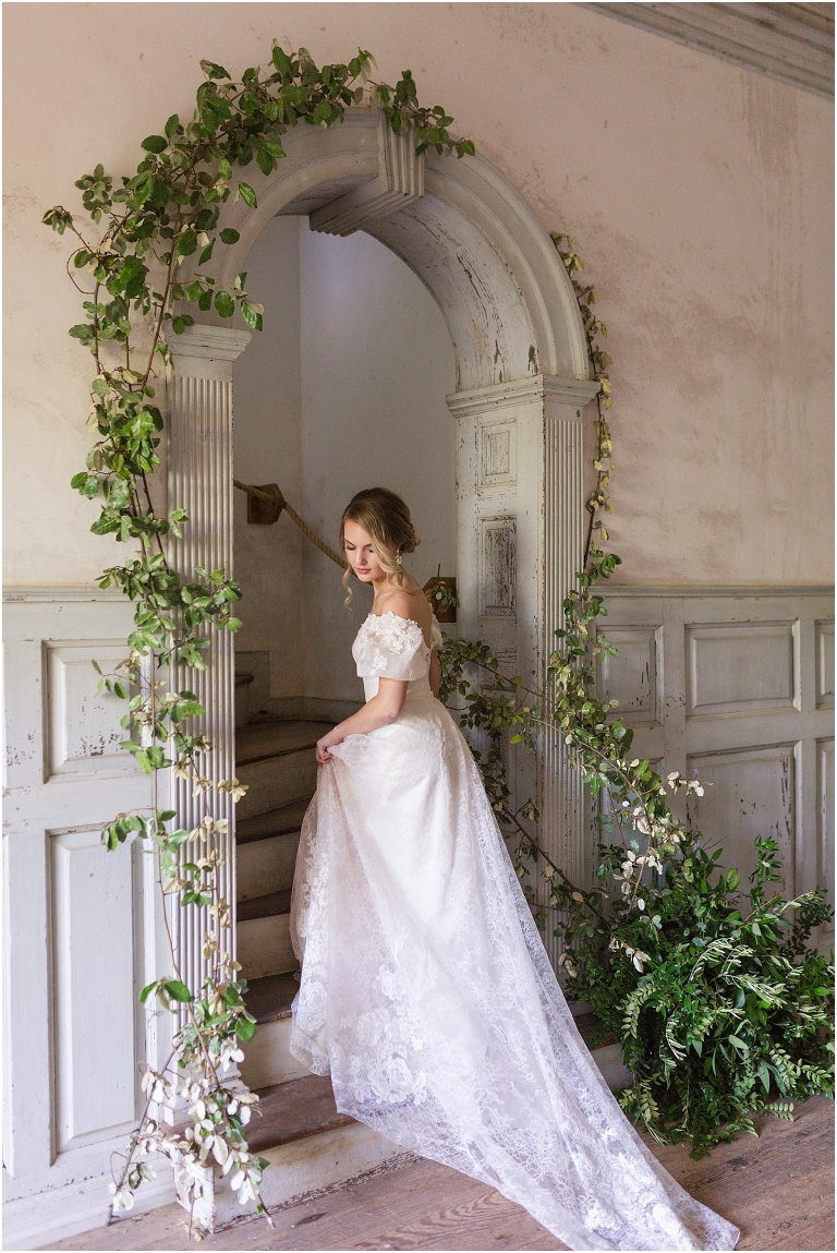 Romantic and classic garden manor wedding inspiration bridal portraits in a fairytale inspired ivy covered stairway