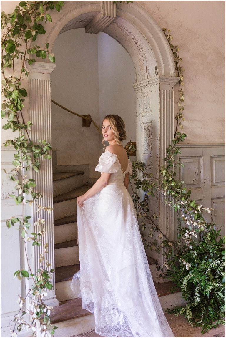 Romantic and classic garden manor wedding inspiration bridal portraits in a fairytale inspired ivy covered stairway