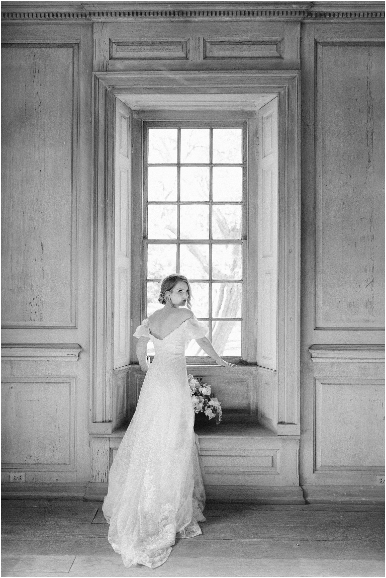 Romantic and classic garden manor wedding inspiration bridal portraits looking out the window light