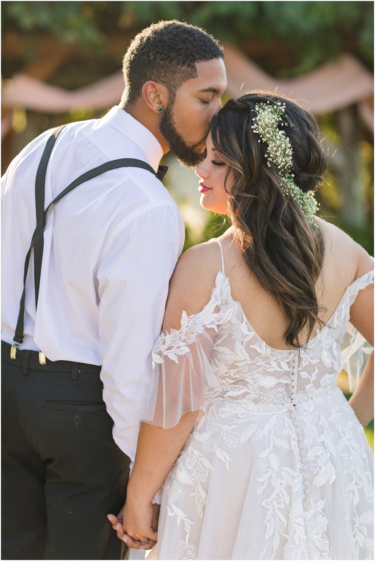 Autumn wedding inspiration with groom in suspenders and bride in boho off shoulder dress