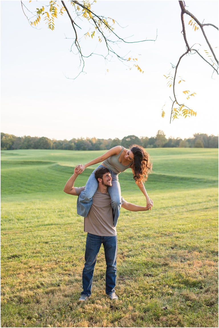 Country couples session in an open field during golden hour