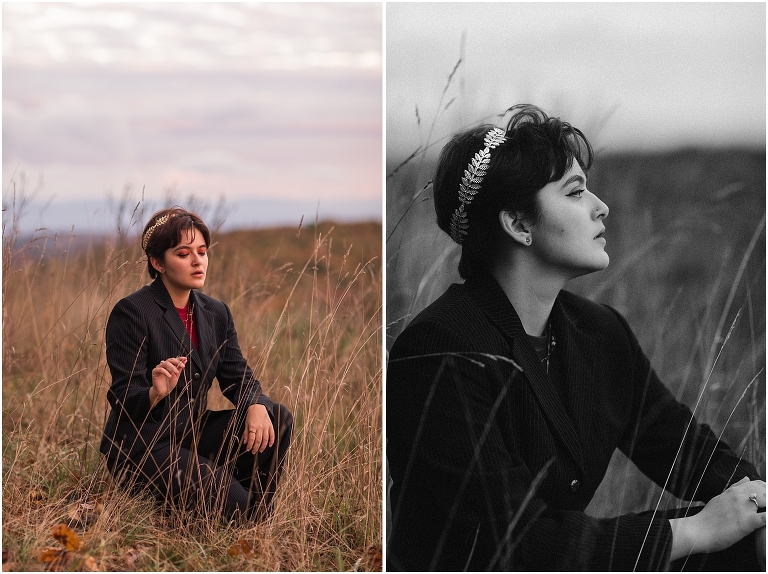 Ares Greek Mythology inspired portrait session all black suit golden crown and sparklers at the top of a hill with a sunset mountain view