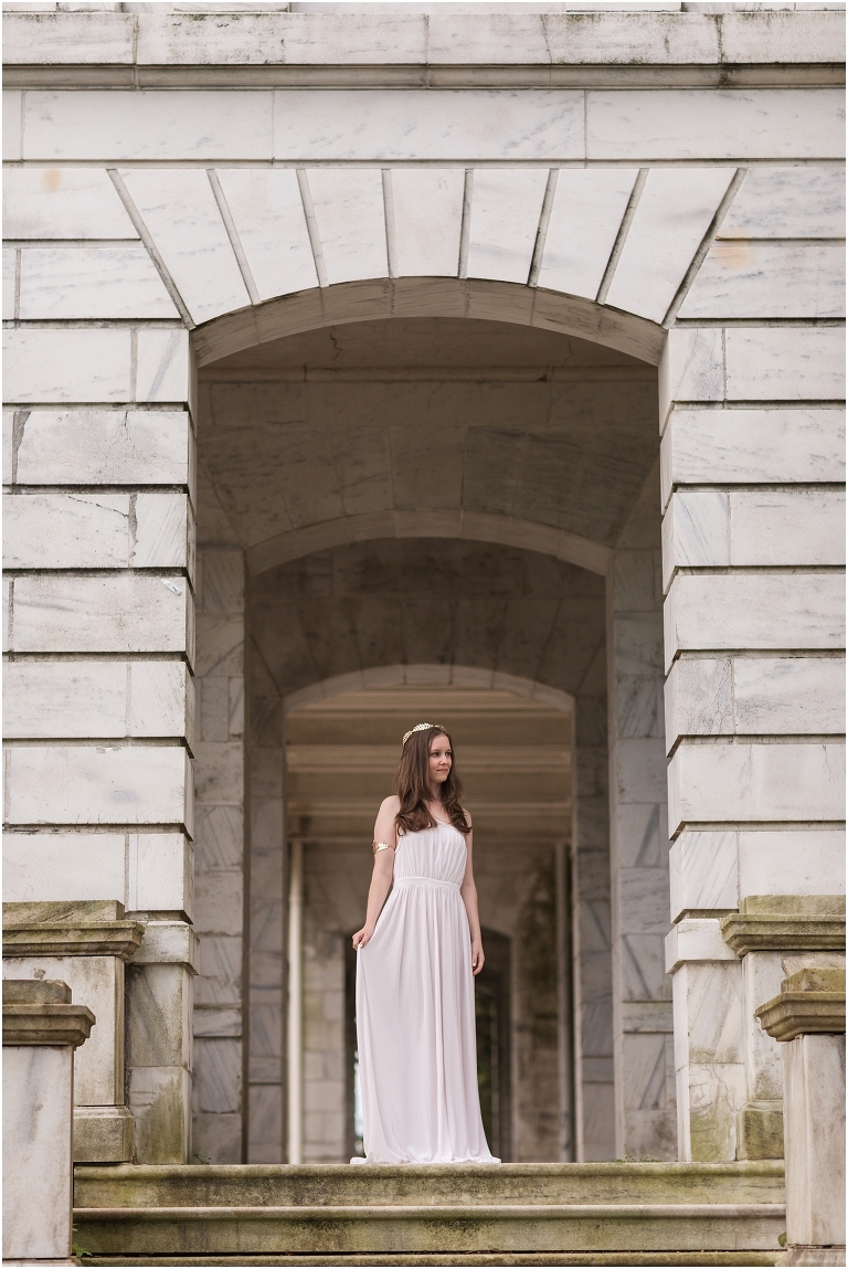 Aphrodite Greek Mythology goddess of beauty and love inspired portrait session white dress golden crown in an abandoned white castle Swannanoa