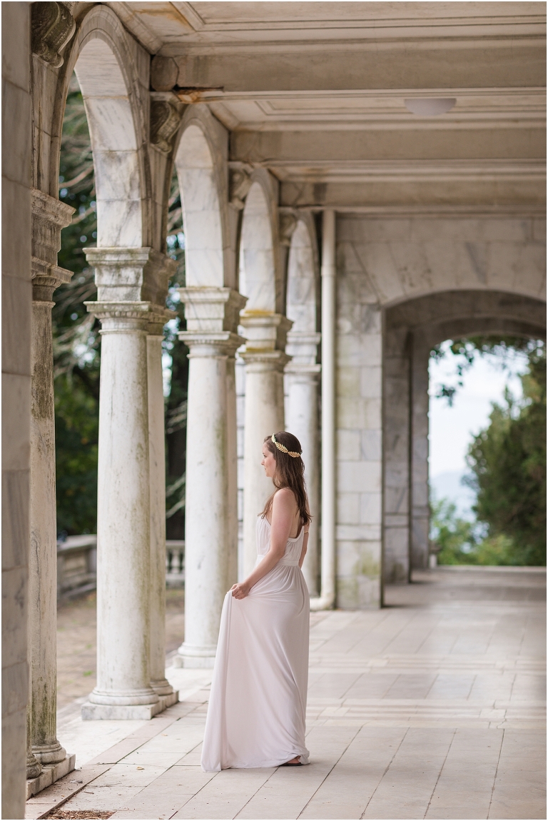 Aphrodite Greek Mythology goddess of beauty and love inspired portrait session white dress golden crown in an abandoned white castle Swannanoa