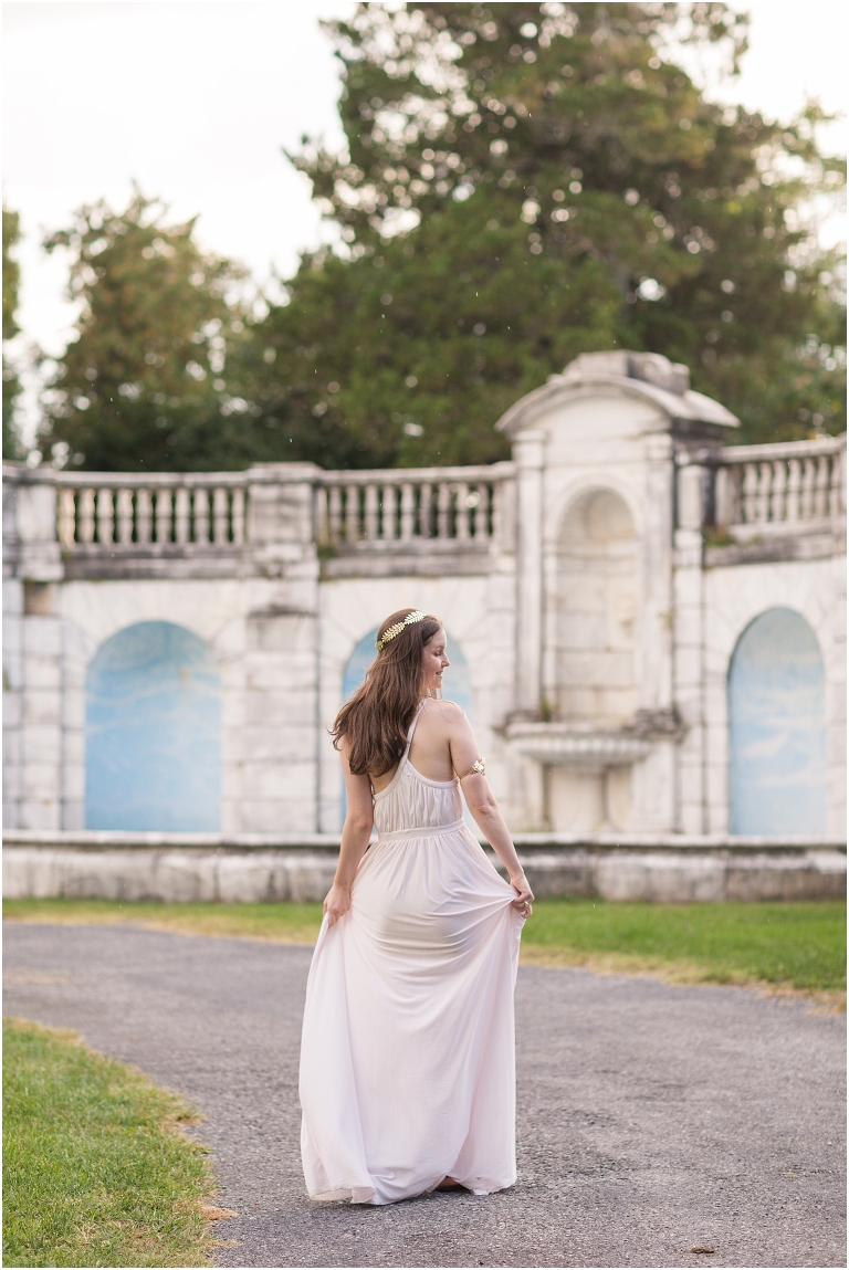 Aphrodite Greek Mythology goddess of beauty and love inspired portrait session white dress golden crown in an abandoned white castle Swannanoa