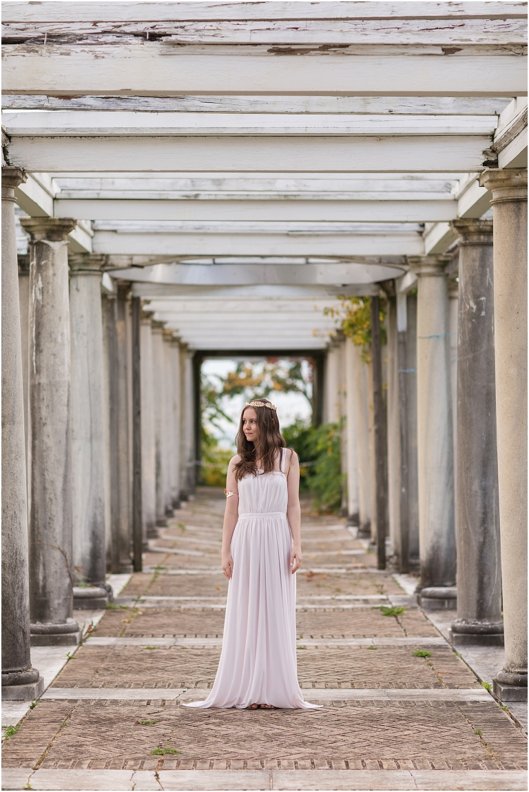 Aphrodite Greek Mythology goddess of beauty and love inspired portrait session white dress golden crown in an abandoned white castle Swannanoa