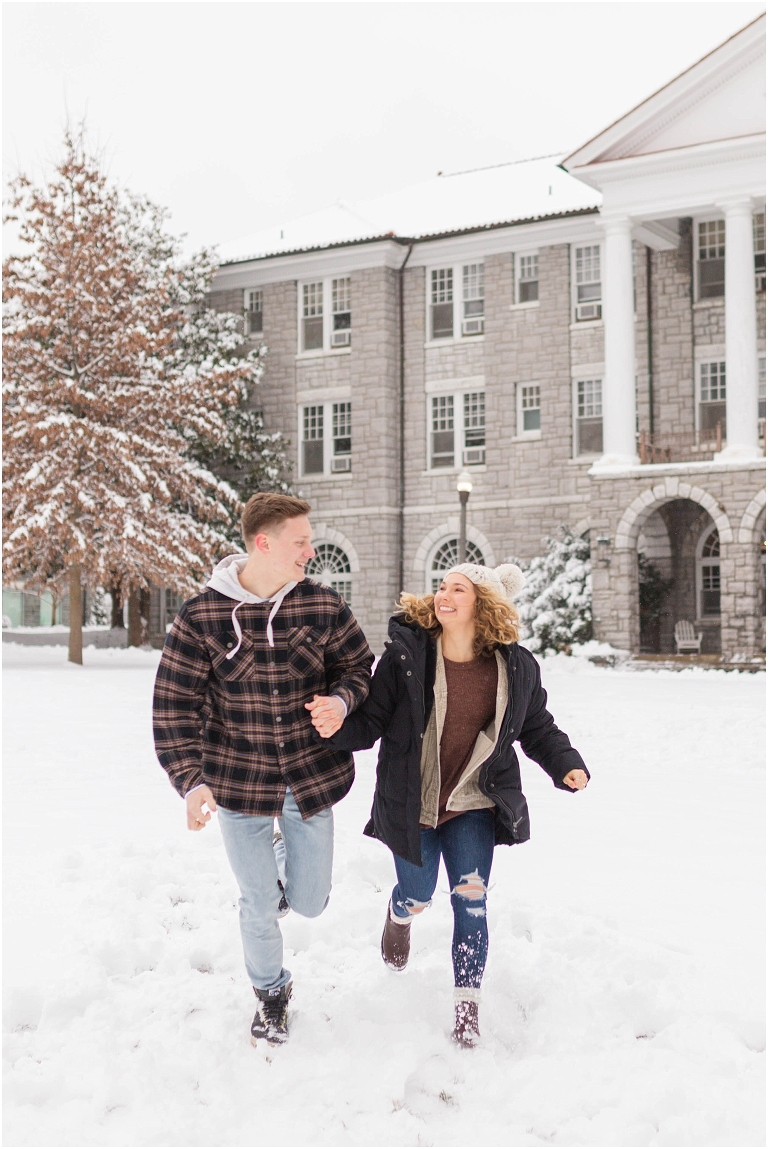 Harrisonburg fun snow couples portraits on the James Madison University Quad