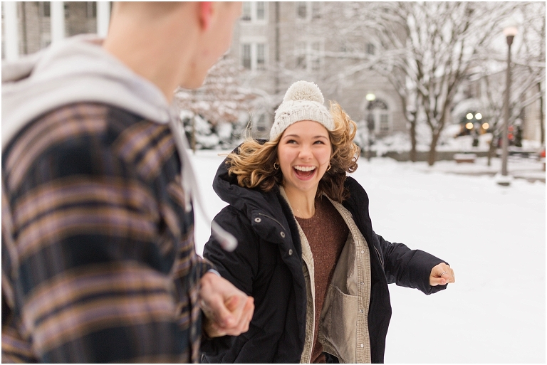 Harrisonburg fun snow couples portraits on the James Madison University Quad