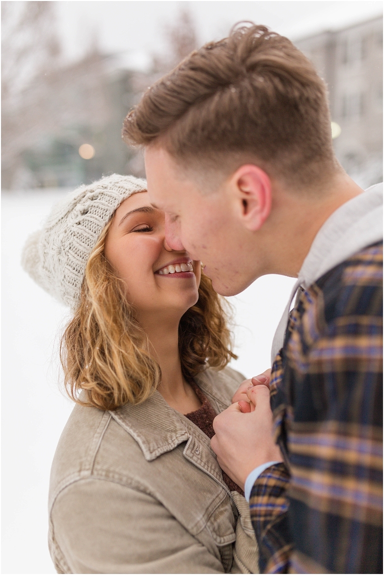Harrisonburg fun snow couples portraits on the James Madison University Quad