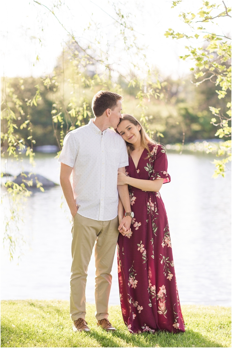 Savanna & Colin's Big Spring Farm spring floral engagement session was a dream. We met at Big Spring Farm just as the trees started blooming, and we had the most magical light for their waterfront engagement session. After walking around and taking photos with all the beautiful trees, we ended the session by getting into the canoe and fighting the wind to get some fun water photos.