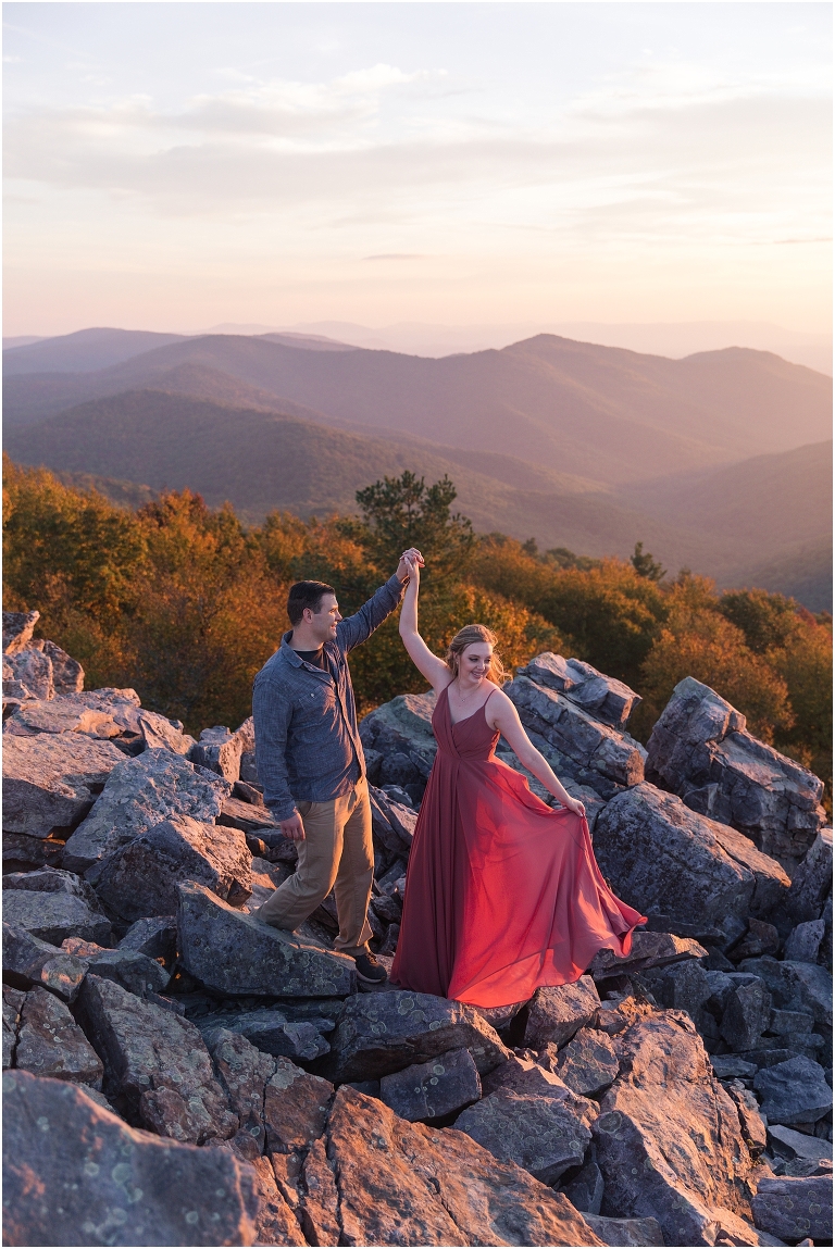 Blackrock Summit hike on Skyline Drive in Shenandoah National Park autumn fall mountain sunset engagement session with flowy maxi pink dress