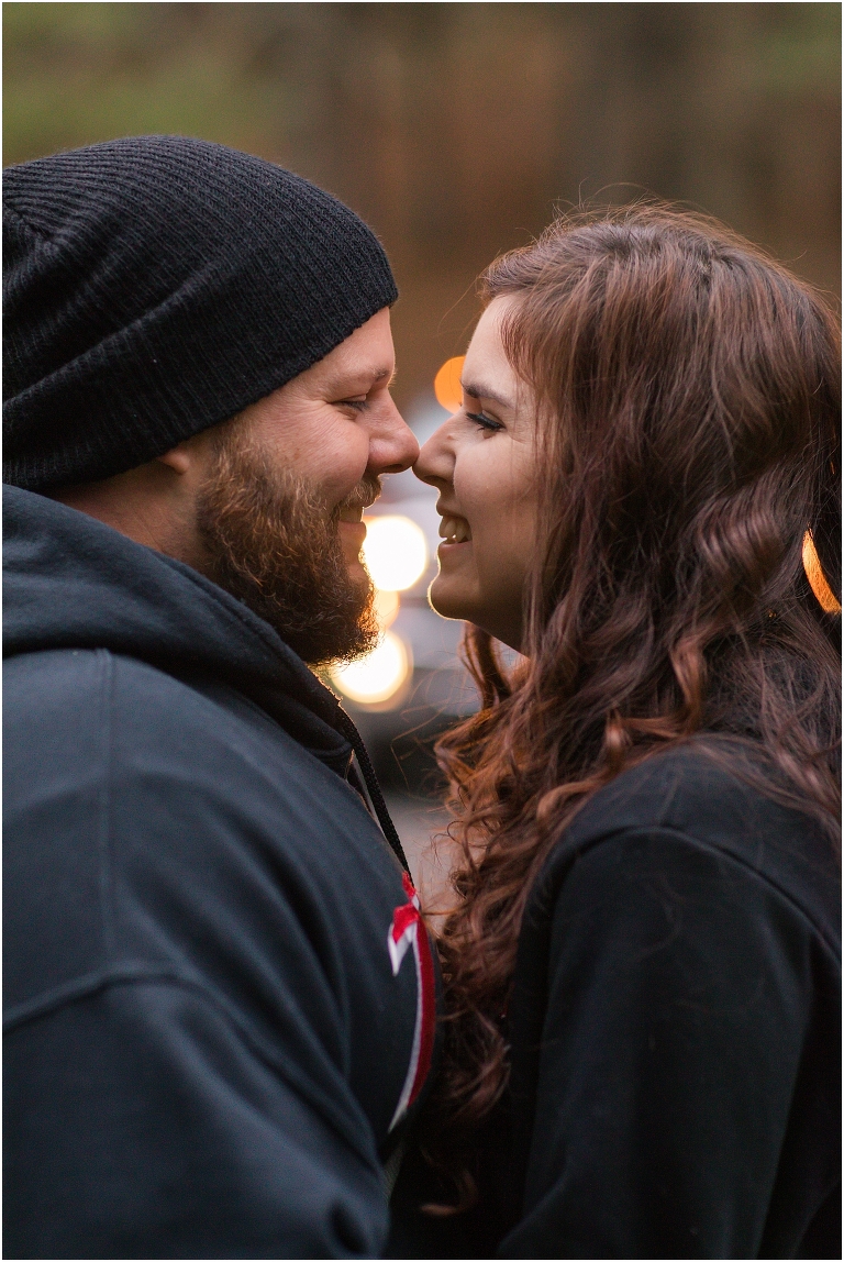 Winter evergreen by the river engagement session in Lost River State Park in West Virginia