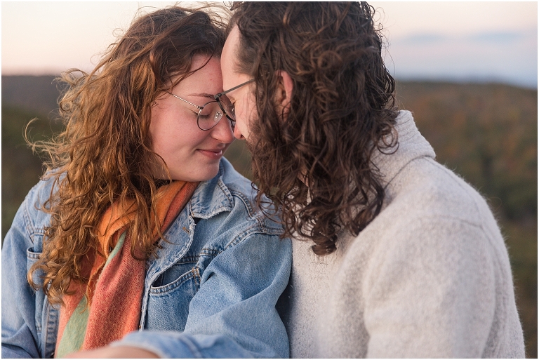 Sunrise mountaintop mountain view hike couples session on Bearfence hike on Skyline Drive in Shenandoah National Park