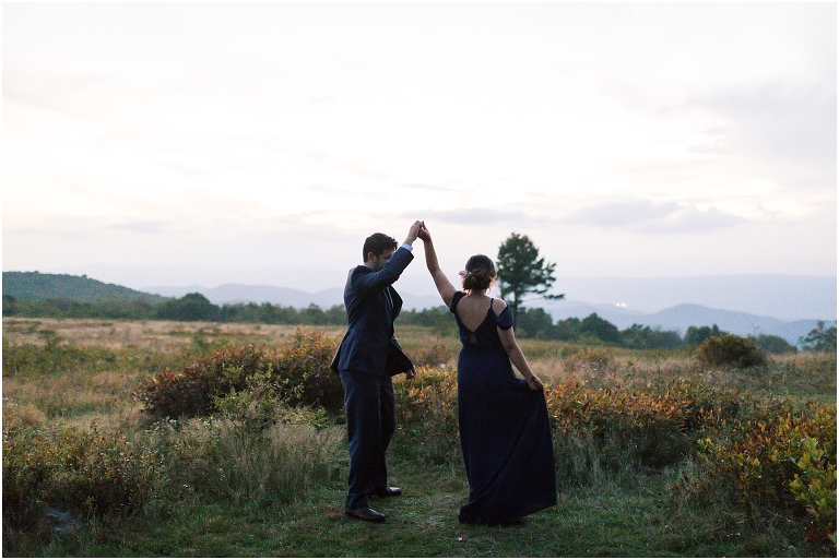Sunset mountain view wildflower open field couples portraits in Big Meadows hike on Skyline Drive in Shenandoah National Park