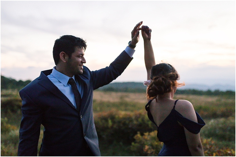 Sunset mountain view wildflower open field couples portraits in Big Meadows hike on Skyline Drive in Shenandoah National Park
