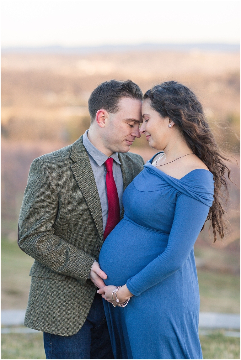 Maternity portraits at Showalter's Orchard in the Shenandoah Valley Virginia with a golden hour sunset mountain view