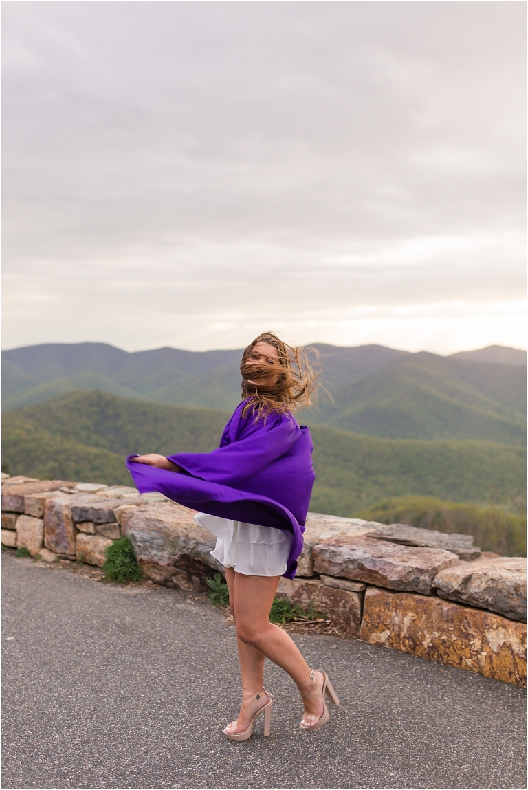 Abigail’s James Madison University Quad and Skyline Drive sunset mountain view overlook senior graduation portraits were some of my FAVORITE from the class of 2021, from her graduation outfit to popping champagne on top of the mountain in her cap and gown!