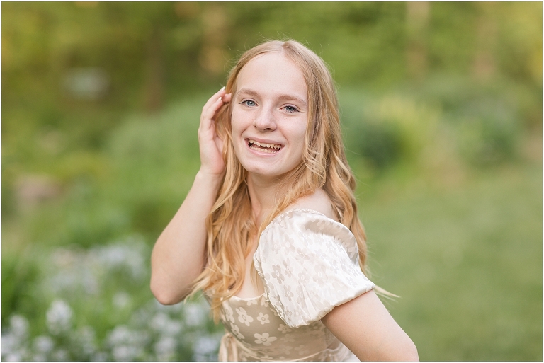 Spring arboretum senior portraits with a gold dress and purple flowers. Edith J Carrier Arboretum in Harrisonburg Virginia, senior graduation portrait photographer