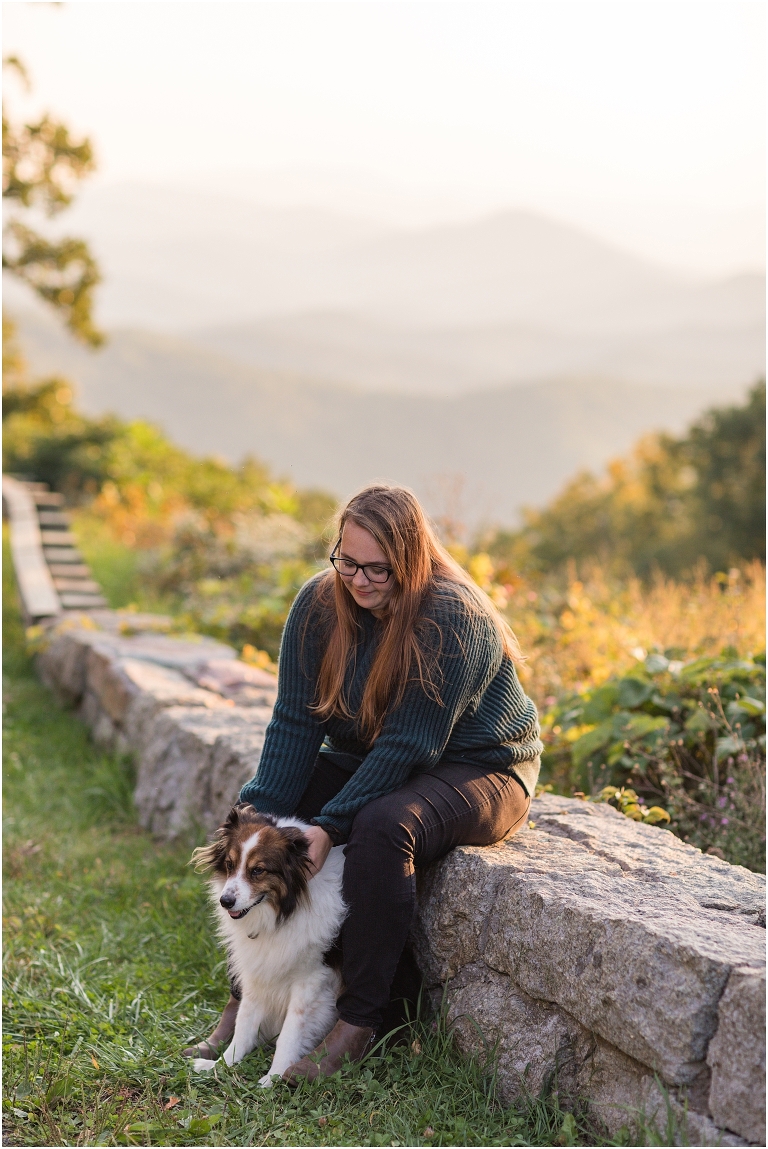 Autumn fall foliage senior portraits at a sunset mountain overlook on Blue Ridge Parkway with dog, Virginia senior graduation portrait photographer