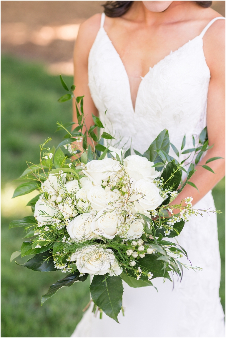 Hannah & Brad's family farm spring wedding ceremony with their antique tractor followed by a Virginia barn wedding reception.