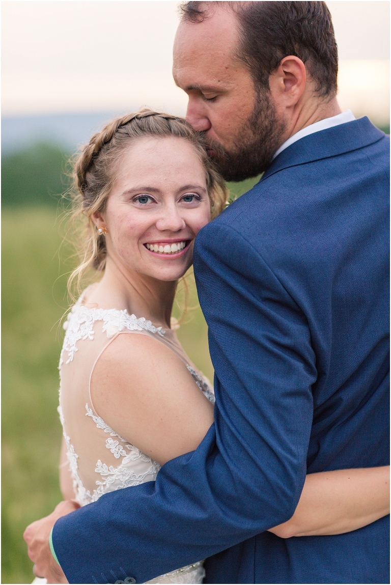 Rachel & Ryan's spring wedding reception at The Barn at Edgewood in Stanardsville, Virginia with sunset mountain portraits.
