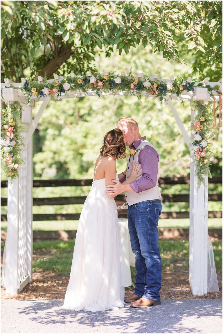 Lora & Zach's spring intimate wedding ceremony at a river overlook followed by their reception and sunset portraits at Rivercrest Farm and Events in the Shenandoah Valley in Virginia.