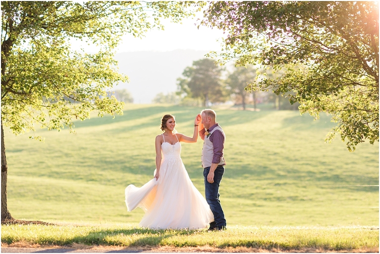 Lora & Zach's spring intimate wedding ceremony at a river overlook followed by their reception and sunset portraits at Rivercrest Farm and Events in the Shenandoah Valley in Virginia.
