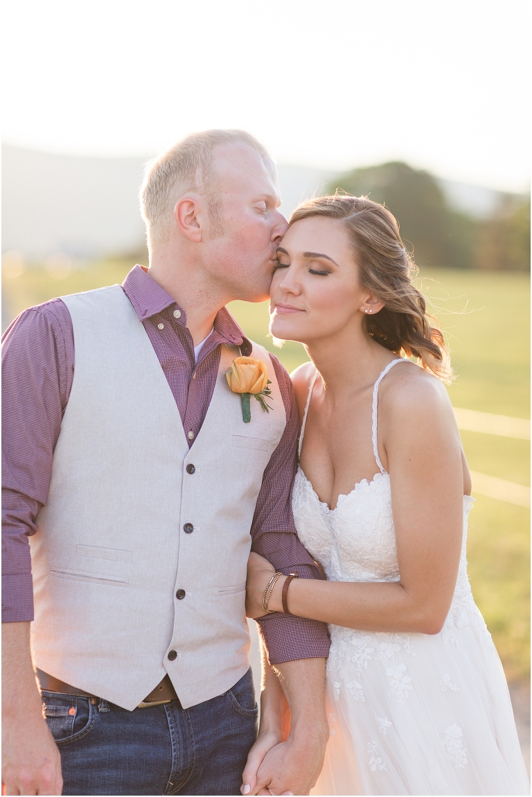 Lora & Zach's spring intimate wedding ceremony at a river overlook followed by their reception and sunset portraits at Rivercrest Farm and Events in the Shenandoah Valley in Virginia.
